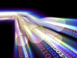 colored binary numbers running through four clear tubes